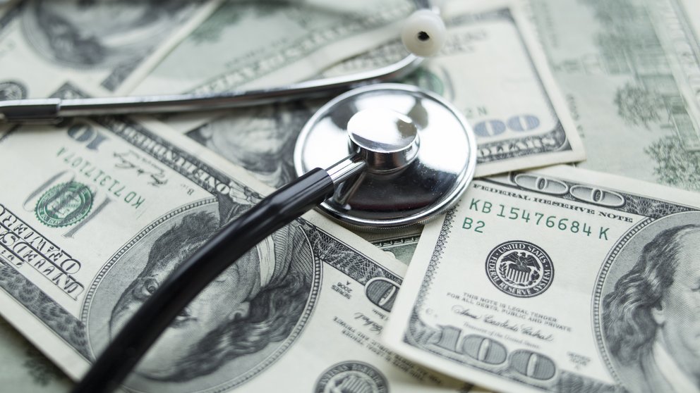 Stethoscope on the dollars.