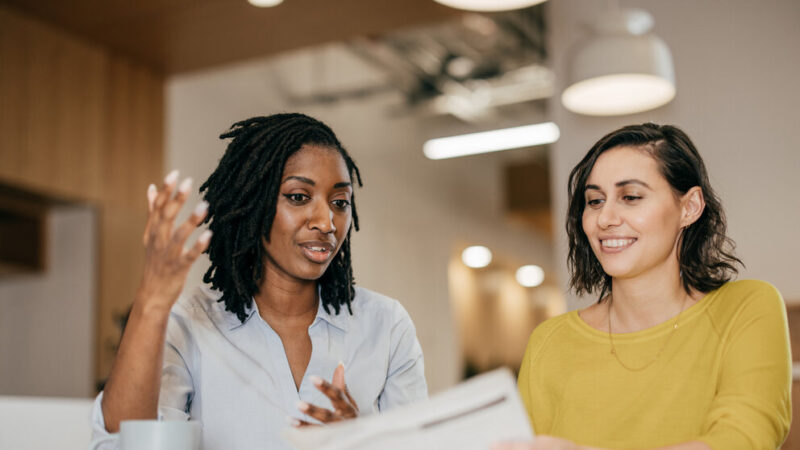 Two women talking about health and welfare strategies